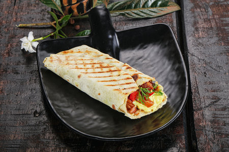 Shawarma roll with chicken and vegetablesの写真素材