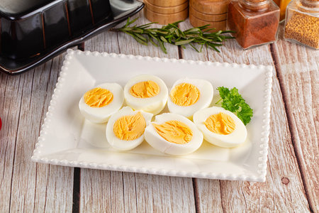Boiled eggs half with bright yolk