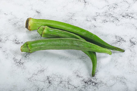 Raw organic natural okra vegetable for cookingの写真素材