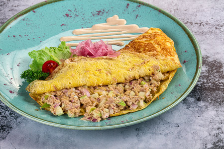 Omelet witn canned tuna fish and onionの写真素材