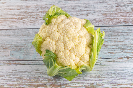 Fresh young cauliflower cabbage for cookingの写真素材