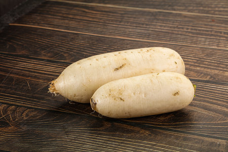 Raw white daikon raddish root for cookingの写真素材