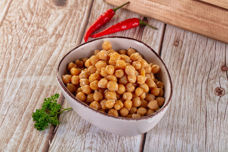 Boiled chickpea beans in the bowl for diet cuisineの写真素材