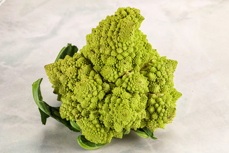 Green raw fresh Romanesco cabbage for cookingの写真素材