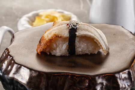Japanese cuisine - sushi with eel served gingerの写真素材