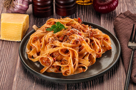 Italian pasta bolognese with beef minced meat and tomato sauceの写真素材