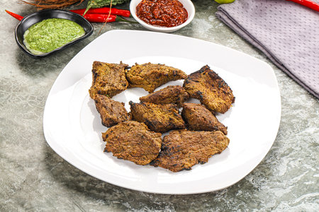 Grilled beef barbecue with spices and herbsの写真素材