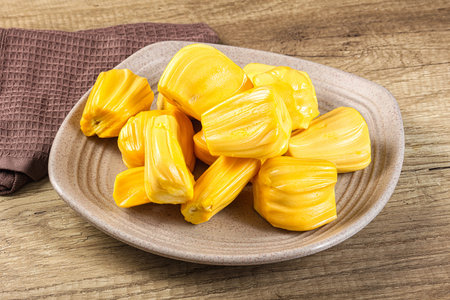 Raw ripe yellow jackfruit segment heap