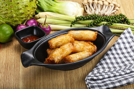 Vietnamese cuisine fried stuffed spring roll with sauce