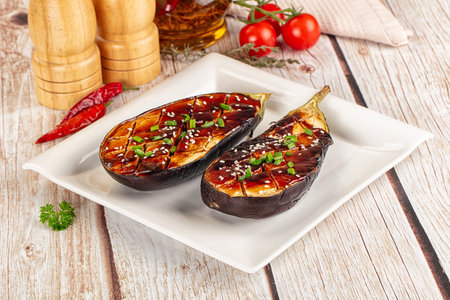 Baked eggplant with teriyaki sause and sesame seedsの写真素材
