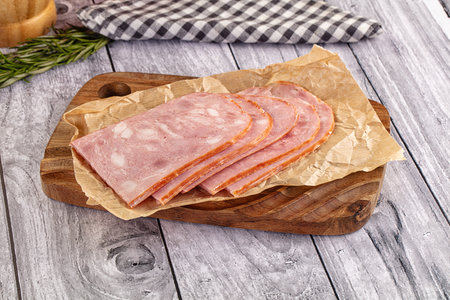 Sliced pork ham over board for breakfast
