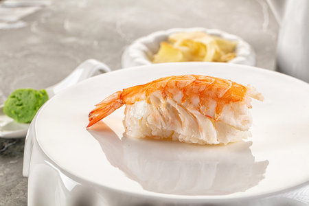Japanese cuisine - sushi with prawn served gingerの写真素材