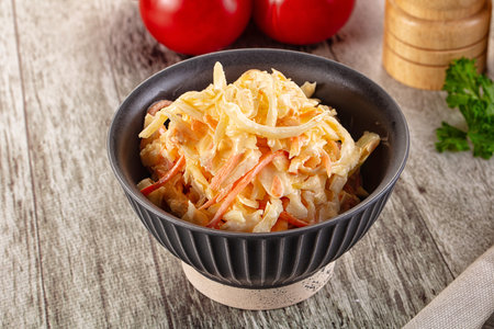 Vegan Coleslaw salad with raw cabbage and carrotの写真素材