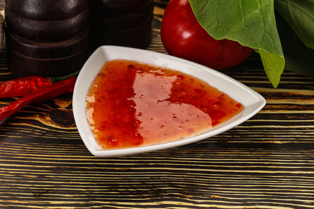 Chinese sweet and sour sauce in the bowlの写真素材