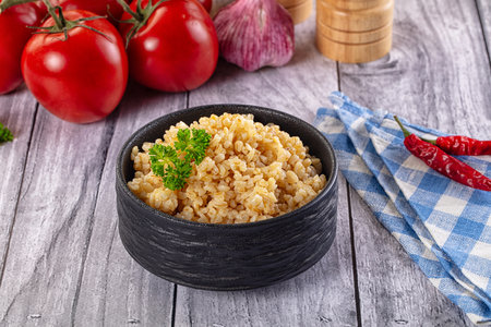 Vegan cuisine - boiled bulgur cereal garnishの写真素材