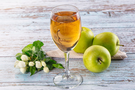 Sweet Apple yellow juice in the glassの写真素材