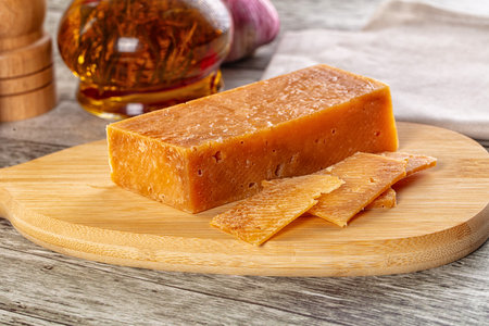 Gourmet hard aged parmesan cheese witj slices