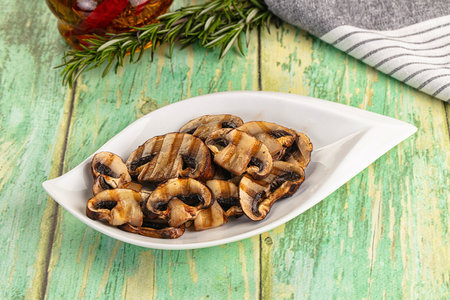 Vegan cuisine - Tasty hot grilled champignon mushroomsの写真素材