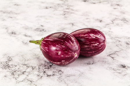Ripe raw mini violet eggplant for cookingの写真素材