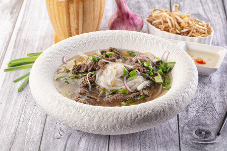 Vietnamese Pho Bo soup with beef and noodles