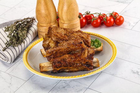 Baked beef ribs with marinade with seasoningの写真素材