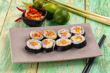 Korean homemade roll Kimbap with nori seaweed, sausages and vegetables
