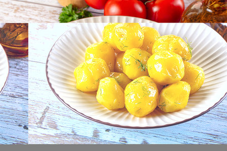Boiled young potato with oil and dill