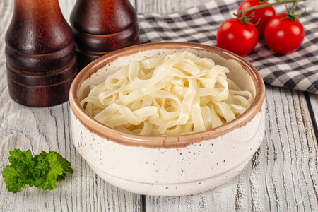 Boiled wheat asian udon noodles in the bowl