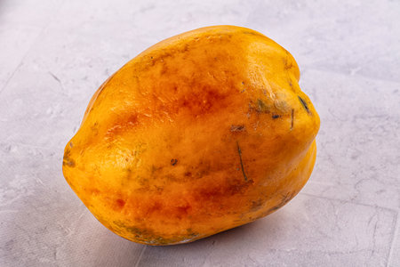 Ripe sweet fresh whole papaya fruitの写真素材
