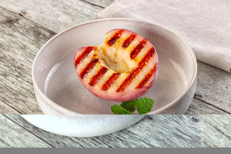 Sweet juicy grilled peaches dietary dessertの写真素材