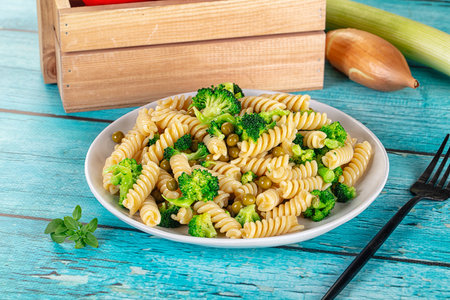 Italian vegan pasta fusilli with broccoli cabbageの写真素材