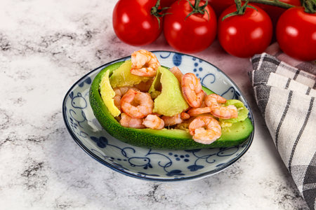 Dietary avocado cut with prawn and lemon juiceの写真素材