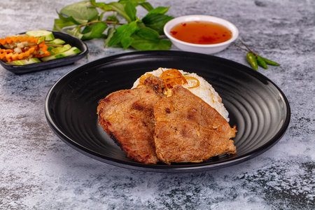 Roasted pork steak with steamed riceの写真素材