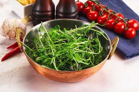 Micro green plants for cooking on the bowlの写真素材