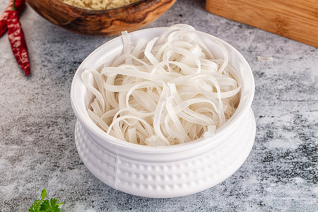 Boiled asian rice pho noodles for soupの写真素材