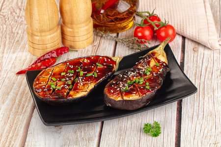 Baked eggplant with teriyaki sause and sesame seedsの写真素材