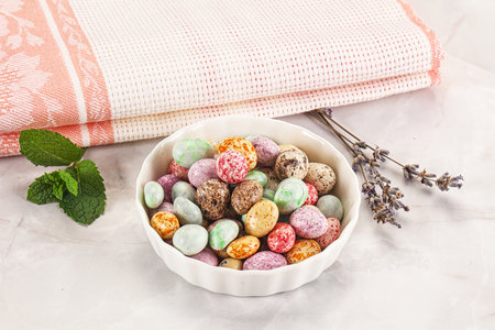 Sweet glazed peanut candy heap in the bowl