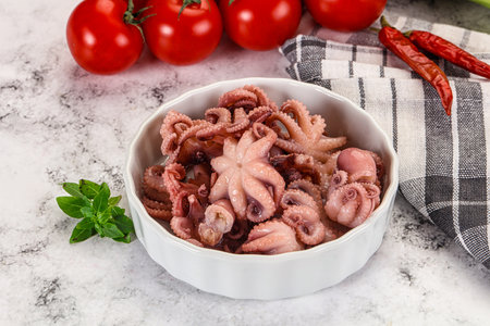 Marinated mini baby octopus in the bowlの写真素材