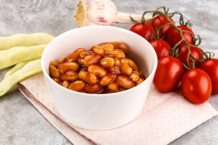 White baked bean in tomato sauce bowl