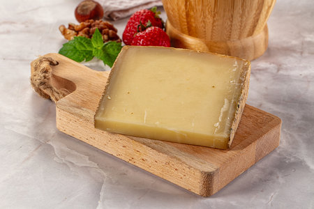Gourmet hard aged yellow cheese piece