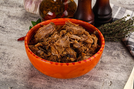 Shredded slow cooked pork meat in the bowkの写真素材