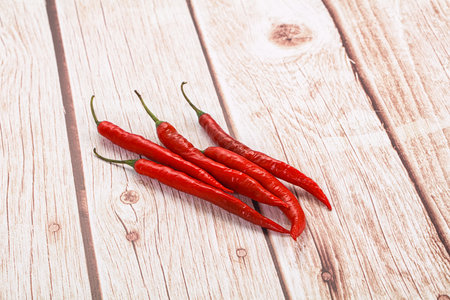 Hot spicy fresh chili pepper heap