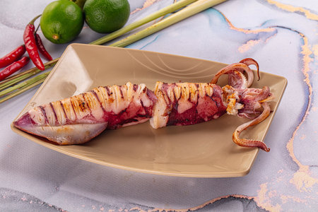 Tasty grilled wild squid with lime - Asian streetfood