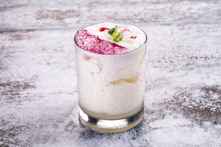 Cold Cocktail with pineapple and coconut