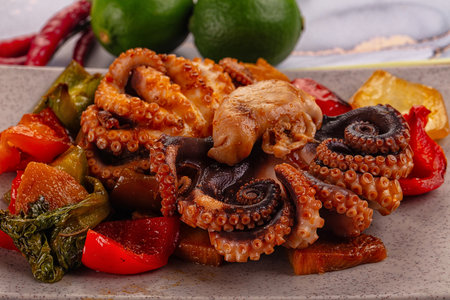 Gourmet grilled octopus with vegetables and sauce