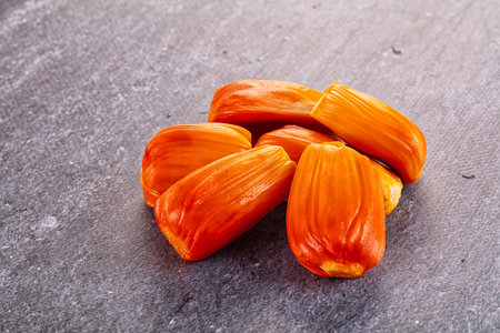 Red sweet juicy tropical red jackfruit segment heapの写真素材