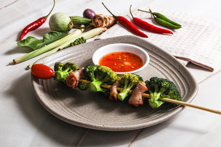 Thai Street foof satay with bacon and broccoli skewerの写真素材