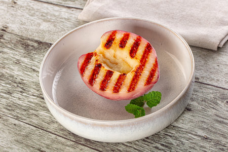 Sweet juicy grilled peaches dietary dessertの写真素材