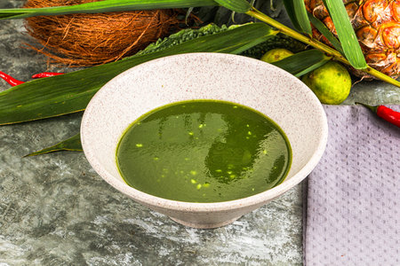 Green spinach cream vegan soup soup with garlikの写真素材