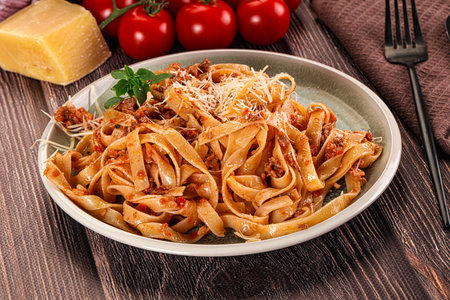 Italian pasta bolognese with beef minced meat and tomato sauceの写真素材